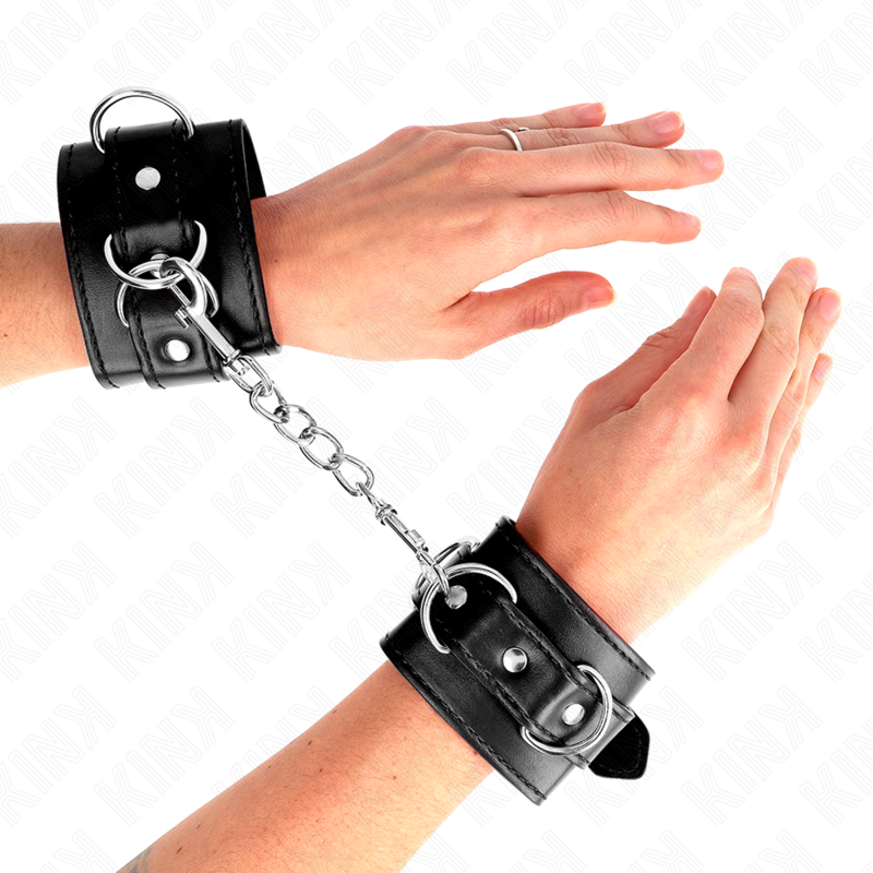 KINK Algemas de Pulso D-Ring ajustáveis pretas, mostrando os detalhes das 3 retenções e argolas D.