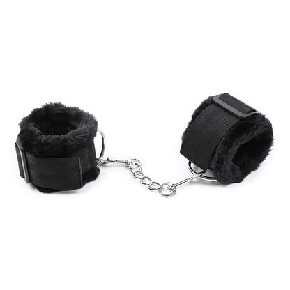 Restrições de Pulso Ohmama Furry Ajustáveis, mostrando o forro de pelo macio e o fecho ajustável.