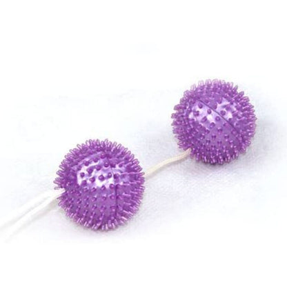 Close-up of the BAILE Textured Vaginal Balls 3.60 CM in purple, highlighting their design.