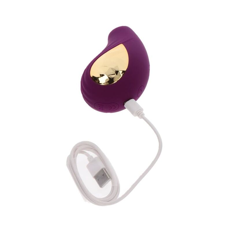 Close-up do Xocoon Estimulador Divine Love Roxo mostrando seu design ergonómico e superfícies texturizadas.