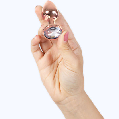 Close-up do Plug Anal de Metal Ouro Rosa Pequeno SECRETPLAY 7 CM, mostrando seu design elegante e textura.