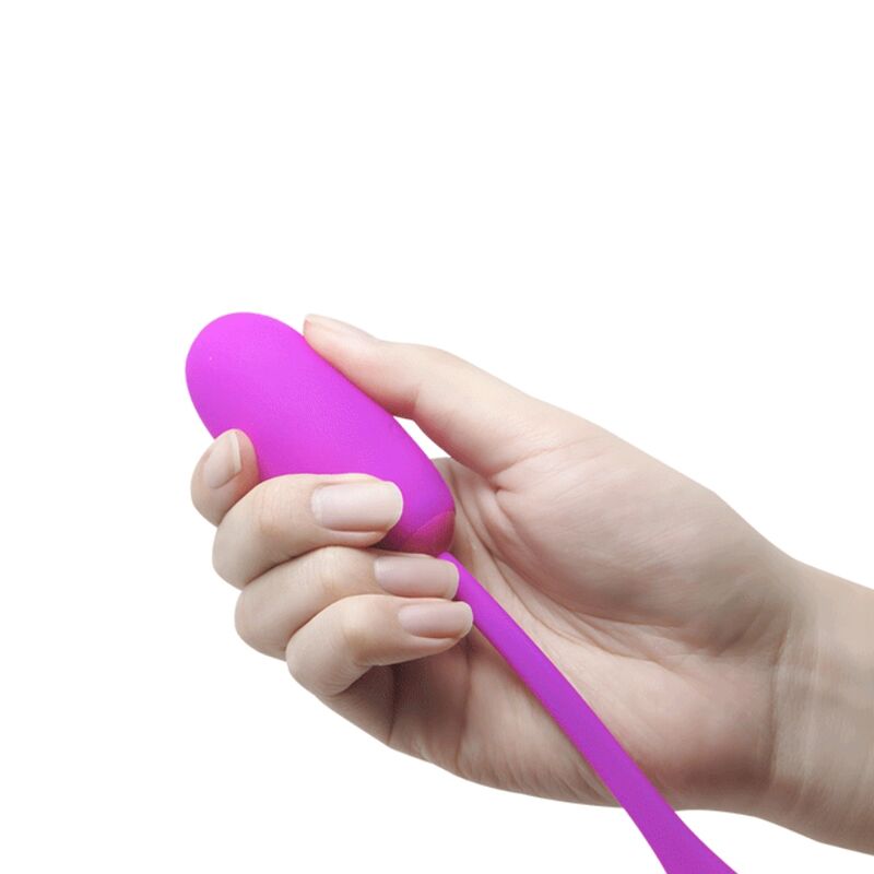 Close-up do Ovo Vibrante Recarregável Pretty Love Julius Roxo em silicone violeta, destacando sua forma ergonômica e suavidade.