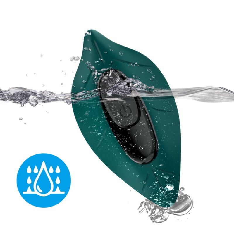 Close-up do vibrador estimulador ARMONY com controle remoto verde, destacando seu design ergonómico e material de silicone.