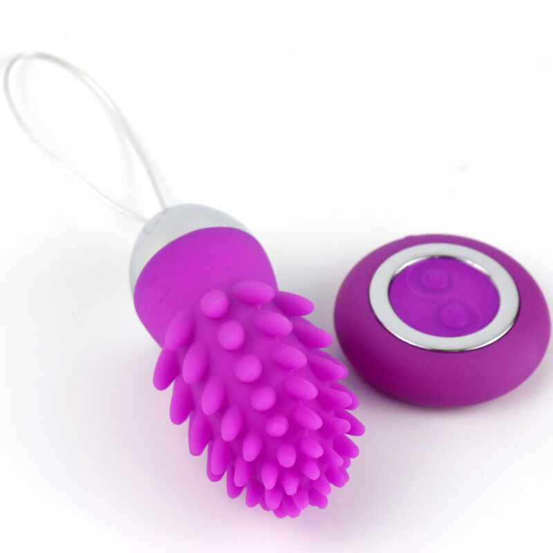 Close-up do Ovo Vibratório Armony Octopus Cactus violeta com controle remoto, destacando sua textura de silicone e design ergonômico.