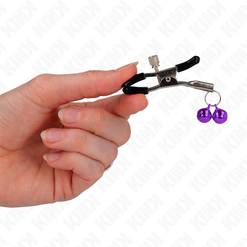 Grampo de Bico Duplo KINK Sino Roxo 6 CM para estimulação de mamilos, detalhe do sino e grampo.