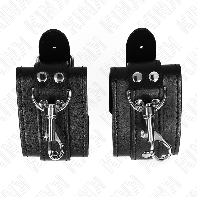 KINK Algemas de Pulso Masmorra Ajustáveis Pretas com Bloqueio para BDSM, exibindo o design e o fecho de segurança.