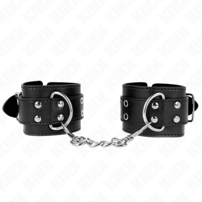 Detalhe dos Punhos KINK com Fivela Dupla Pretos Ajustáveis, mostrando as fivelas e o material durável.