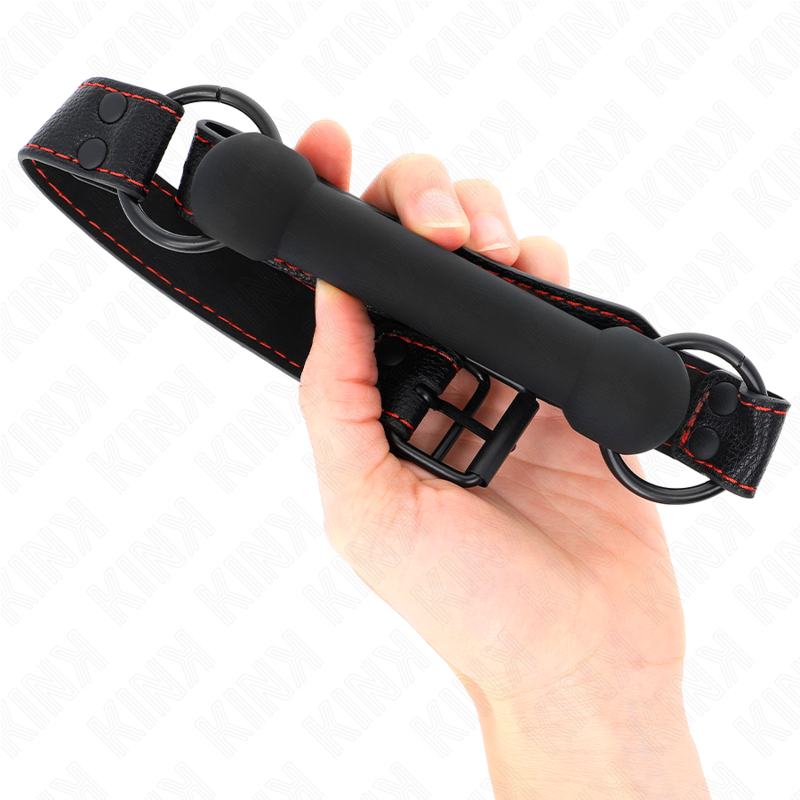 Mordaça de osso KINK com alça de couro preta ajustável para sessões BDSM, detalhe do design realista e material de qualidade.