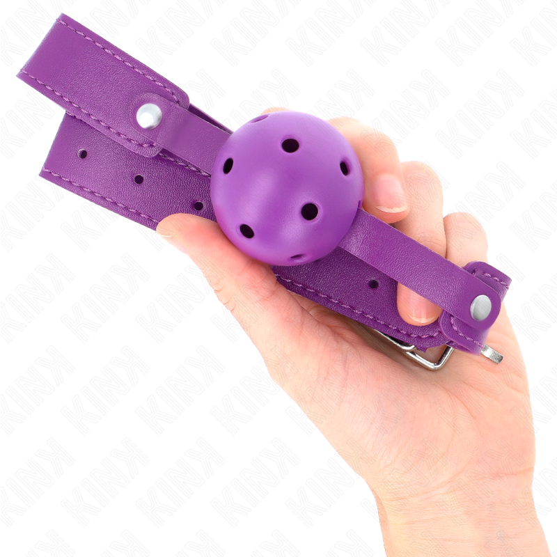 KINK Mordaça Bola Respirável Roxa 4,5cm com correia ajustável, mostrando detalhes do silicone e fecho.