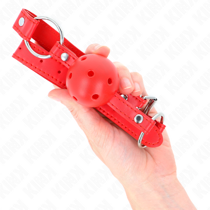 Close-up of the KINK Mordaça de Bola Respirável 4 CM Vermelha Ajustável, showing its silicone ball and adjustable strap.