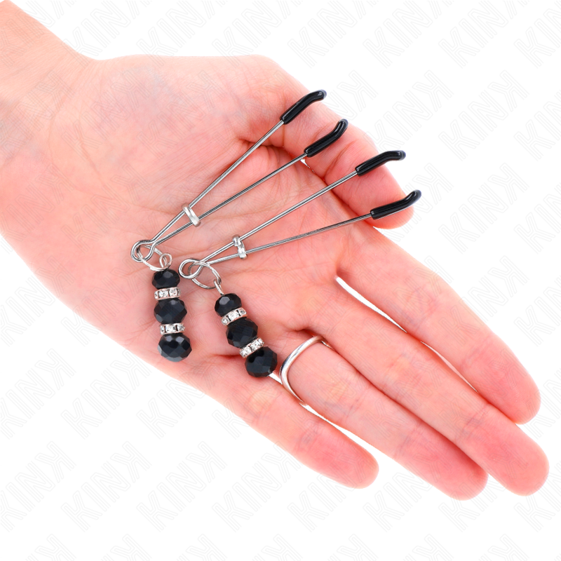 Pinças KINK Finas Douradas para Mamilos com Contas Pretas, detalhe do design e material
