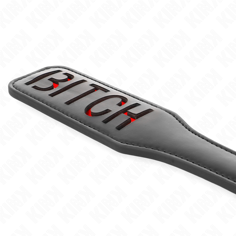Paleta KINK Canto Redondo Bitch 32 x 6 cm para BDSM, mostrando detalhes do design e material.
