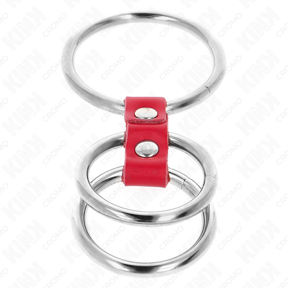 Close-up do KINK Anel Peniano Triplo de Metal com Couro Vermelho, mostrando seus materiais e design.