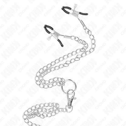 Close-up of the KINK Anel de Pênis Triplo Metal Cromado com Corrente e Grampos de Mamilo, highlighting its design and features.