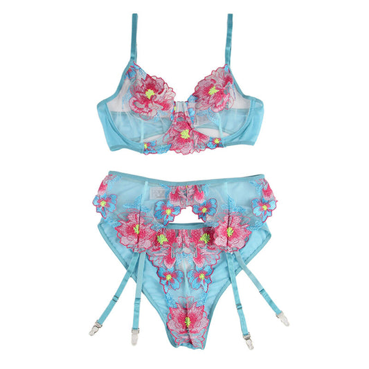 Conjunto de lingerie floral azul SUBBLIME com sutiã, calcinha e cinto-liga.
