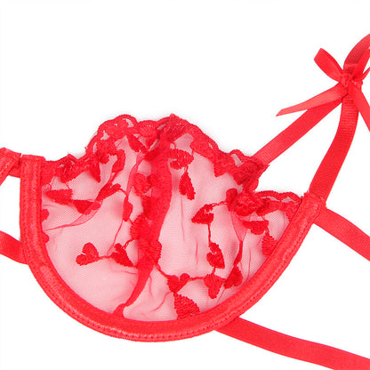 Close-up do Conjunto Lingerie Subblime 3 Peças Coração Vermelho S/M mostrando detalhes da estampa e do tecido.
