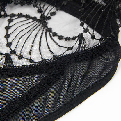 Close-up do Body SUBBLIME Renda Oca Transparente Preto L/XL, mostrando a textura da renda e o design sensual.