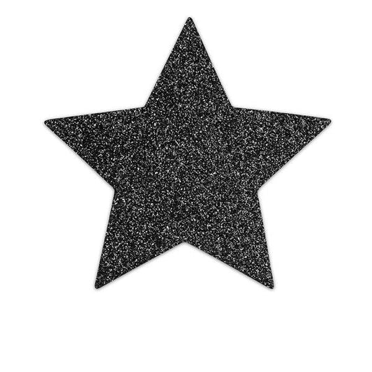 Detalhe dos Bijoux Indiscrets Black Star Flash Nipple Caps autoadesivos com brilho estrela