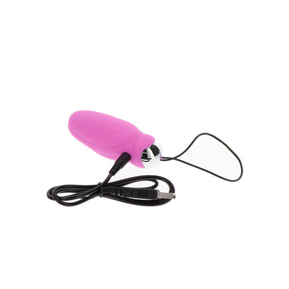 Close-up do vibrador ovo TOYJOY You Crack Me Up Rosa com controle remoto, destacando sua forma e textura macia.