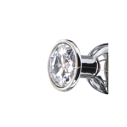 Close-up do TOYJOY Plug Anal Médio Diamond Bum Bijou com joia, mostrando seu design cônico e material de alumínio.