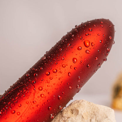 ROCKS-OFF Bala Vibrante Rouge Allure Vermelha com design aveludado e detalhes elegantes