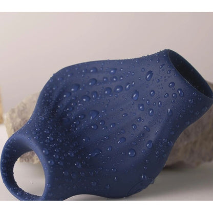 Close-up of the ROCKS-OFF Masturbador Vibrador Flexível Palm Blue showing its ergonomic design and textured interior.