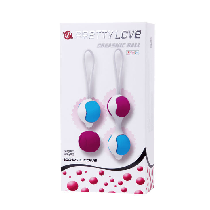 Close-up da Pretty Love Bola Orgásmica Deluxe com pesos intercambiáveis, mostrando o design de silicone macio e o suporte.