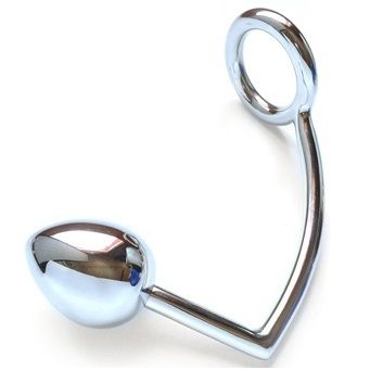 Close-up do Anel Peniano METAL HARD com Gancho Anal e Bola de 40mm, destacando o design em aço cirúrgico.