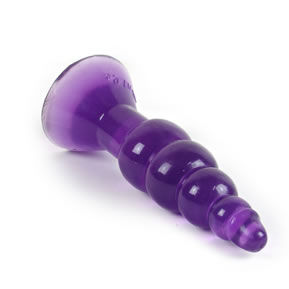 Close-up do Plug Anal BAILE Climax Acontece de Gelatina Ondulado com ventosa, cor lilás.