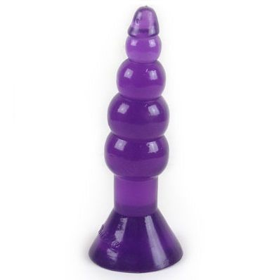 Close-up do Plug Anal BAILE Climax Acontece de Gelatina Ondulado com ventosa, cor lilás.