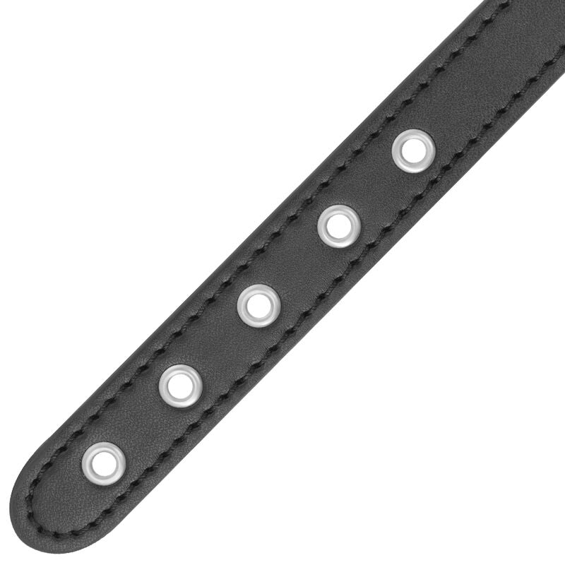 Anel peniano Darkness com alça e corrente para BDSM, em couro vegano preto e detalhes metálicos.